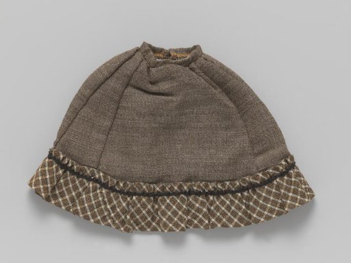 Skirt of brown wool with checkered trim and slits