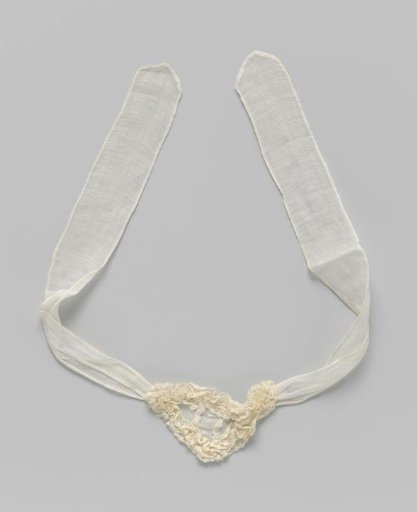 Cap of white cotton with long flaps