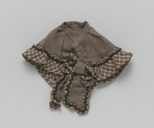 Skirt of brown wool with checkered binding and gussets
