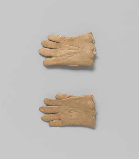 Leather glove with white button