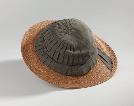 Hat with flat brim of orange band straw and supple crown of brown grosgrain ribbon