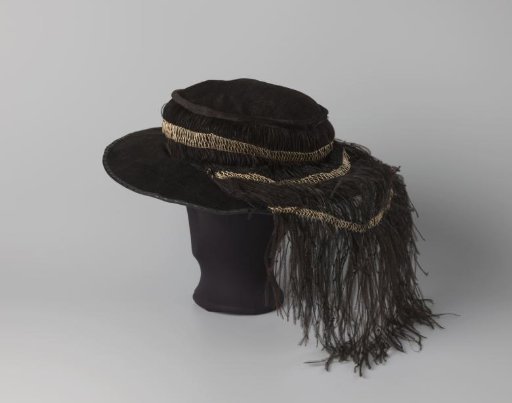 Hat of black velvet with band of snipe feathers