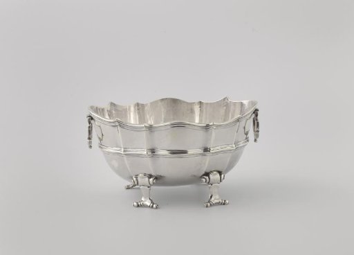 Sauce boat, oval, with carved sides rising slightly