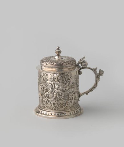Silver cup with handle featuring a winged female figure