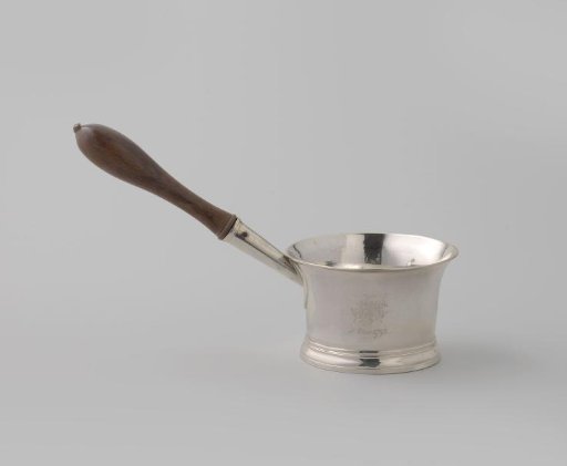 Silver porringer. Cylindrical with a wooden handle. The vessel widens towards the top. Engraved monograms on the body, respectively JMB and GMS.