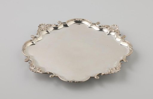 Sheet, octagonal, with alternating bracket-shaped curved sides and round protruding sides