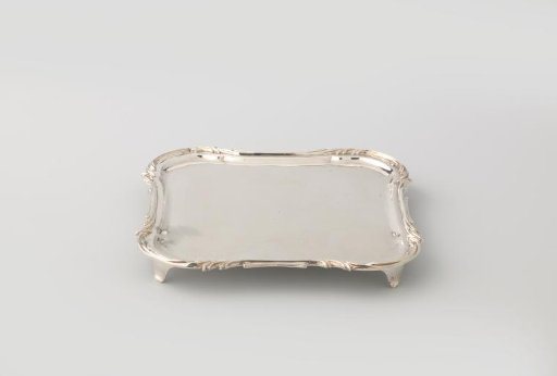Plate, square, with slightly projecting and hanging corners, resting on four feet