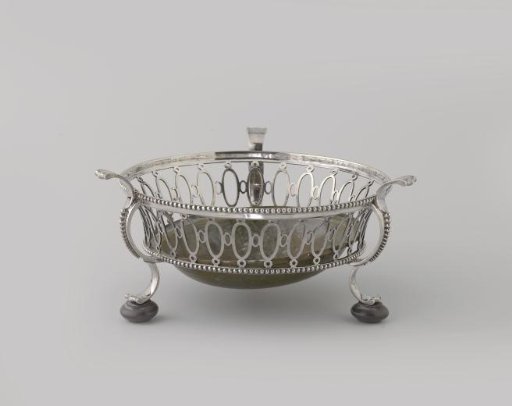 Stove, round, with openwork wall with ovals and edged with pearl mouldings