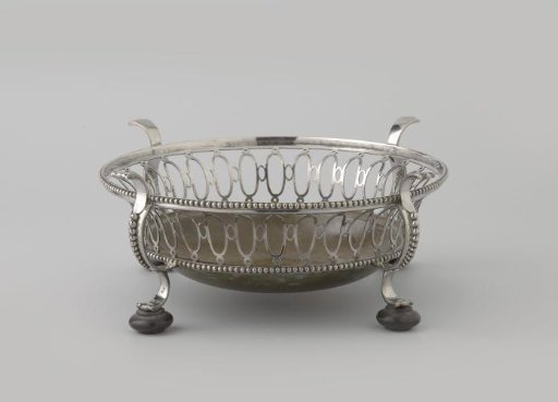 Stove, round, with openwork wall with ovals and edged with pearl mouldings