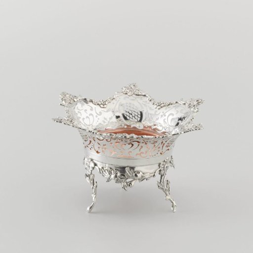 Silver warming pan on three legs. Vessel with six-pointed pierced rim. Inner bowl of copper.