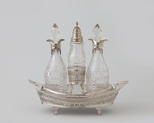 Bottle with stopper belonging to an oil and vinegar set consisting of two bottles and a sugar scoop in an oval holder