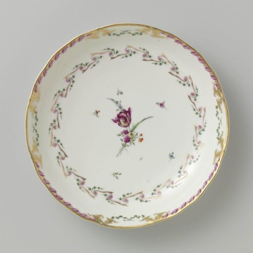 Bowl, round and deep, belonging to a service decorated with a swirled ribbon motif with leafy branches, floral bouquets, and scattered flower branches
