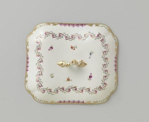 Lid, elongated, with a knob, belonging to a service with a swirled ribbon motif featuring leafy branches, floral bouquets, and scattered flower branches