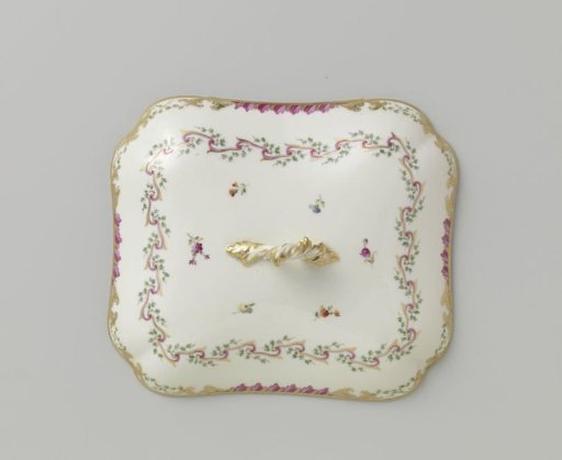 Lid, elongated with a knob, belonging to a service with a swirled ribbon motif featuring leafy branches, floral bouquets, and scattered flower branches