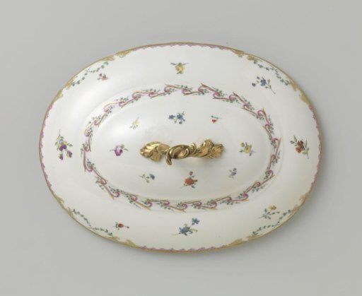 Lid with a knob, oval in shape, belonging to a service with a swirled ribbon motif featuring leafy branches, floral bouquets, and scattered flower branches