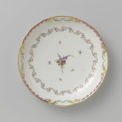 Bowl, round and deep, belonging to a service decorated with a swirled ribbon motif with leafy branches, floral bouquets and scattered flower branches