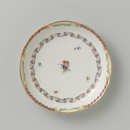 Bowl, round and deep, belonging to a service decorated with a swirled ribbon motif with leafy branches, floral bouquets and scattered flower branches