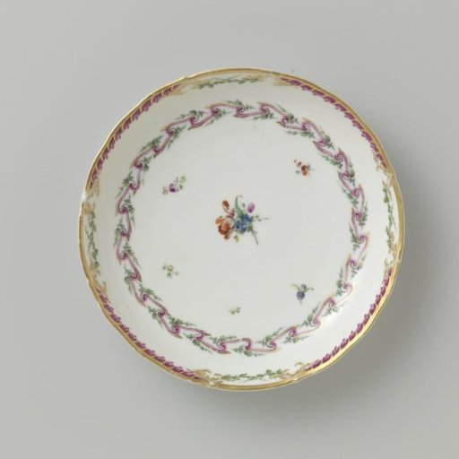 Bowl, round and deep, belonging to a service decorated with a swirled ribbon motif with leafy branches, floral bouquets and scattered flower branches
