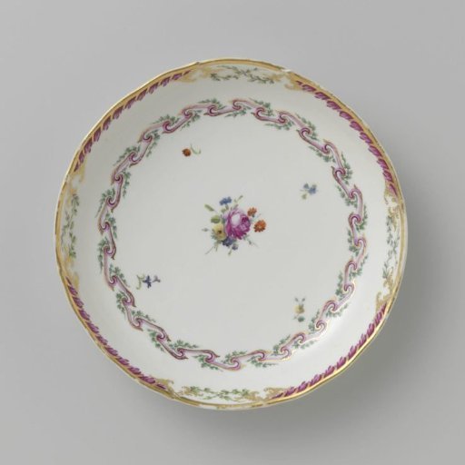Bowl, round and deep, belonging to a service decorated with a swirled ribbon motif with leafy branches, floral bouquets and scattered flower branches