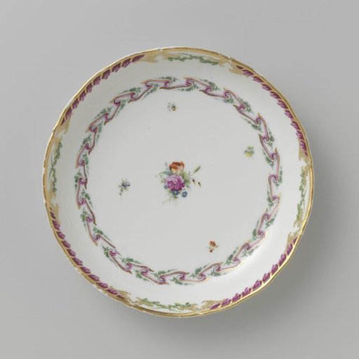 Bowl, round and deep, belonging to a service decorated with a swirled ribbon motif with leafy branches, floral bouquets and scattered flower branches