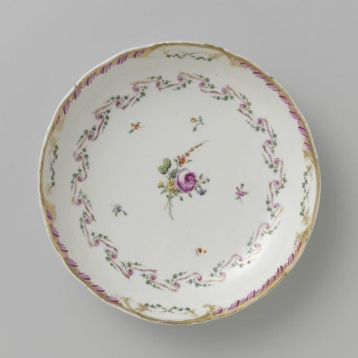 Bowl, round and deep, belonging to a service decorated with a swirled ribbon motif with leafy branches, floral bouquets, and scattered flower branches