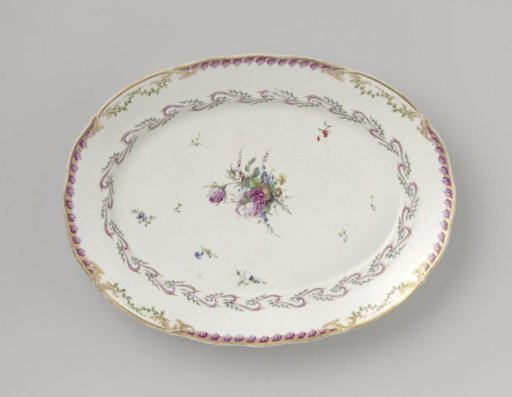 Dish, flat, large and oval, belonging to a service with a swirled ribbon motif with leafy branches, flower bouquets and scattered flower sprays