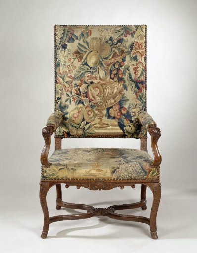 Armchair upholstered with tapestry featuring vases with fruit and foliage