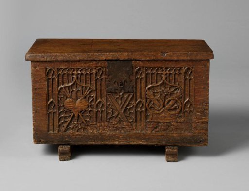 Chest, decorated with Gothic tracery, crossed arrows, flint and steel, and the Burgundian cross