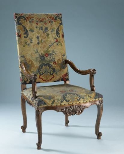 Armchair of walnut wood with petit-point upholstery