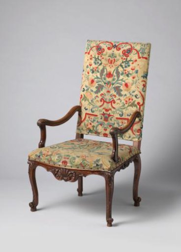 Armchair of walnut wood with petit-point upholstery