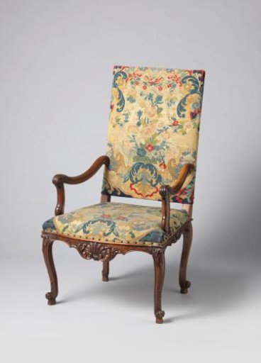 Armchair of walnut wood with petit-point upholstery