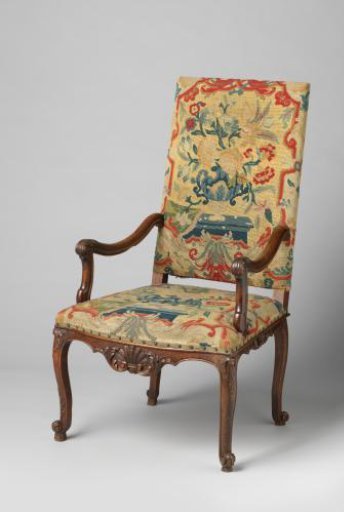Armchair of walnut wood with petit-point upholstery
