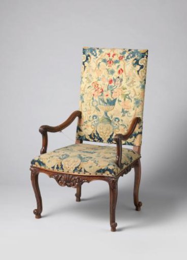Armchair of walnut wood with petit-point upholstery