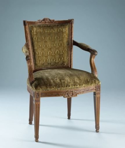 Chair of mahogany, upholstered in tripe with a continuous pattern of hanging oval bows containing a flower on a striped ground