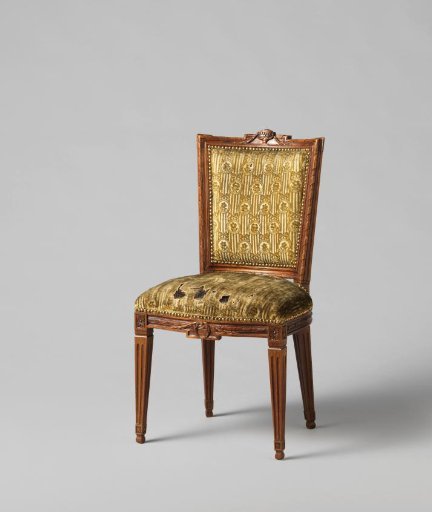 Chair of mahogany, upholstered in tripe with a continuous pattern of hanging oval bows containing a flower on a striped ground
