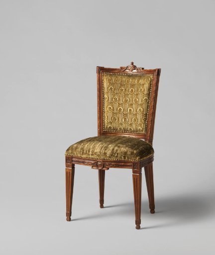 Mahogany chair upholstered in tapestry with a continuous pattern of ovals hanging from bows, containing a flower on a striped background