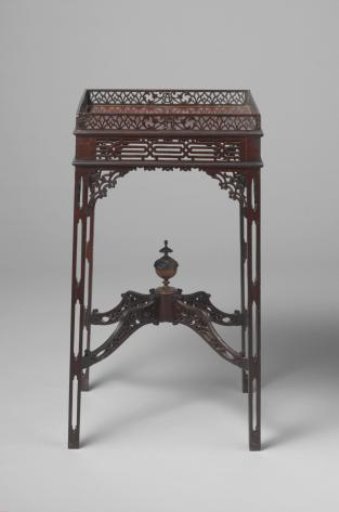 Table, decorated in the Chinese Chippendale style, with a glass top.