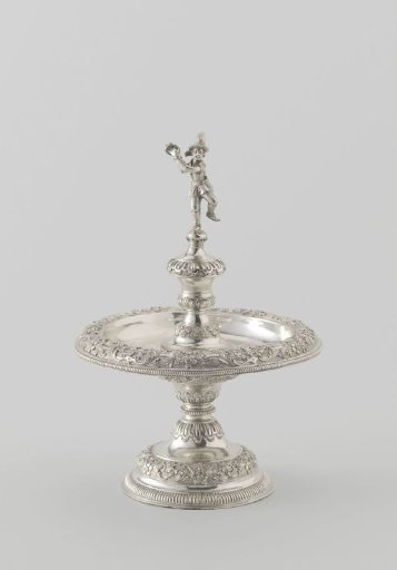 Salt cellar in the form of a fountain, decorated with a dancing male figure