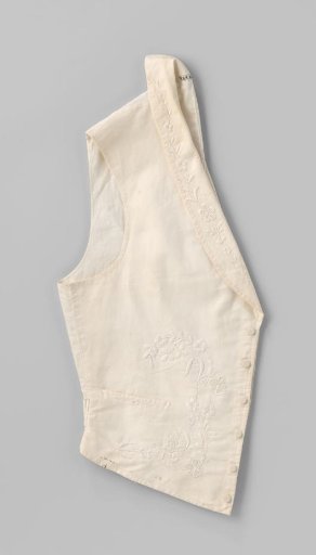 Waistcoat of white cotton piqué, embroidered with floral and leafy vines in white cotton and fitted with shawl collar and patch pockets