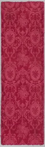 Fragment of a wall covering of cherry-red silk damask