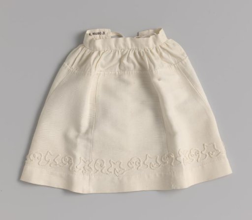 Skirt of white cotton piqué, part of a doll's dress