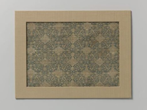 Fragment of blue silk fabric with leaf motifs in ogival shapes
