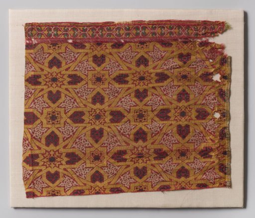 Fragment of lampas with a pattern formed by yellow banding