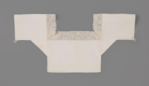 Chemisette with strip of Binche lace, decorated with running floral scroll with lobed leaf