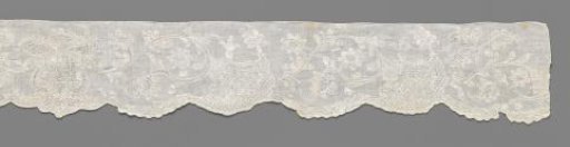 Strip of lace embroidery with volute scrolls on a floral ground and leaf rosette