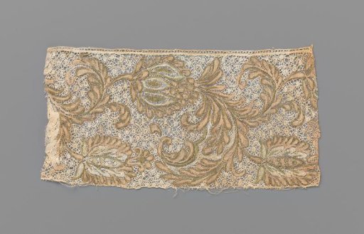 Strip of bobbin lace with old-pink and moss-green painted flowers and leaves