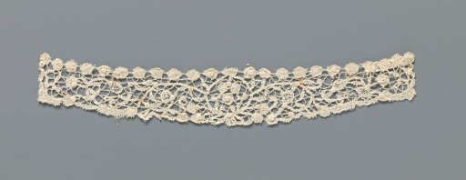 Cuff of Mixed Lace with Circular Border and Curling Sparse Branches with Flowers on Either Side
