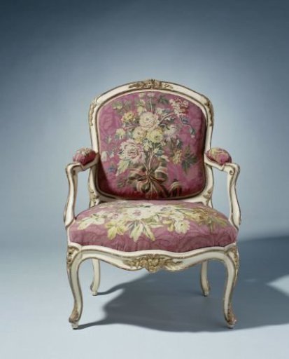 Armchair upholstered in tapestry with floral bouquets