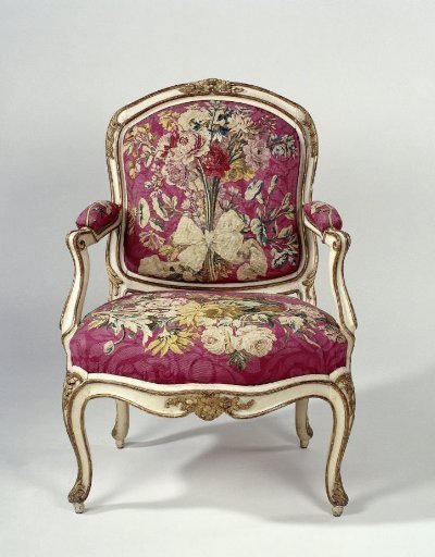 Armchair upholstered in tapestry with floral bouquets