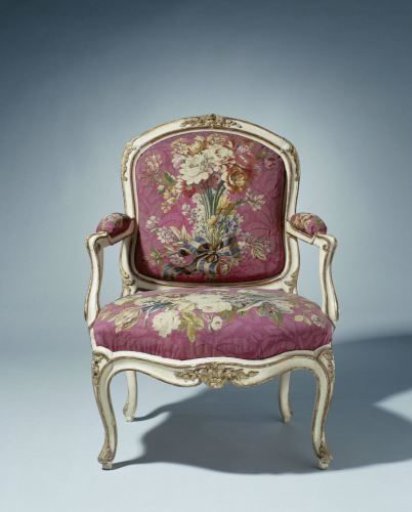 Armchair upholstered in tapestry with floral bouquets